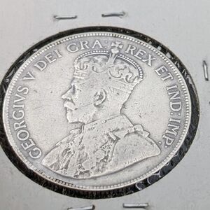 Silver Coin with King Portrait